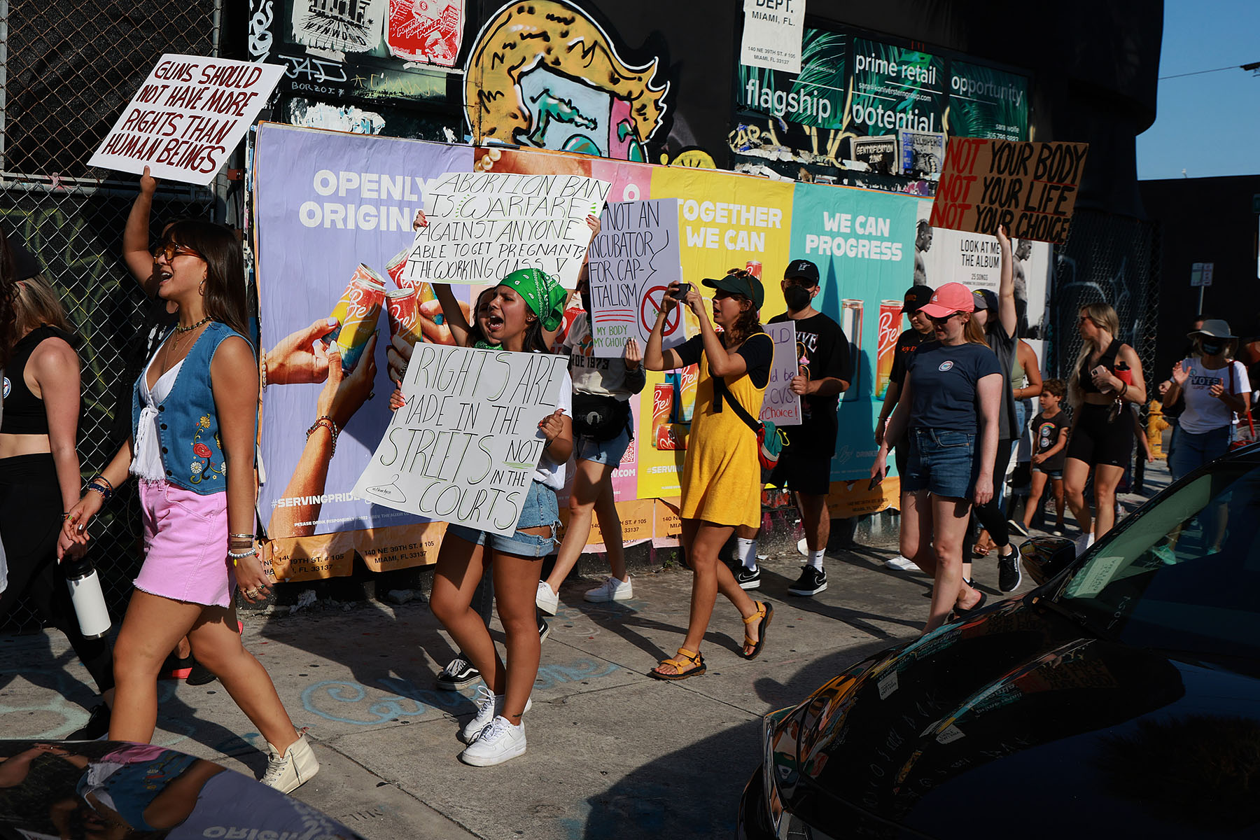 People march together to protest the Supreme Court's decision in the Dobbs v Jackson Women's Health case on June 24, 2022 in Miami, Florida.