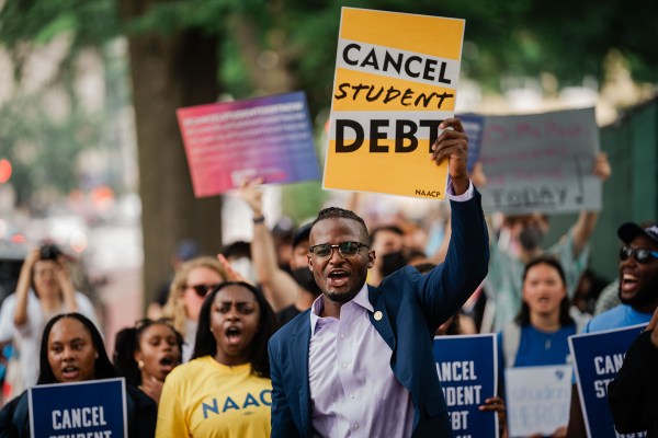 People march from the Supreme Court to the White House after the nation's high court stuck down President Biden's student debt relief program.