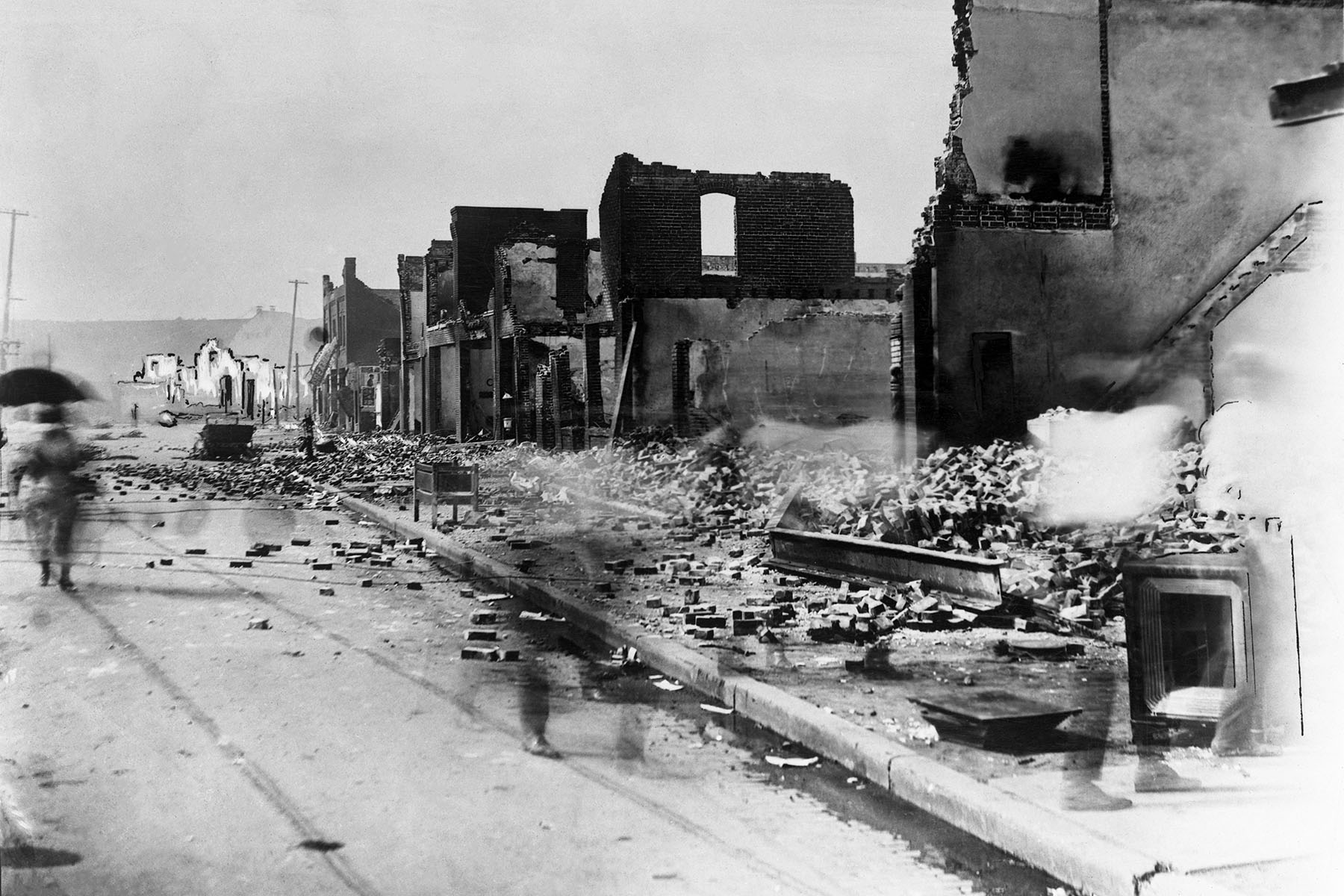 Destroyed homes and businesses are seen in the aftermath of the Tulsa Massacre.