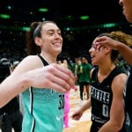 Breanna Stewart greets players following a WNBA basketball game in May 2023, in Seattle.