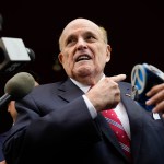 Former Mayor of New York Rudy Giuliani speaks to reporters.