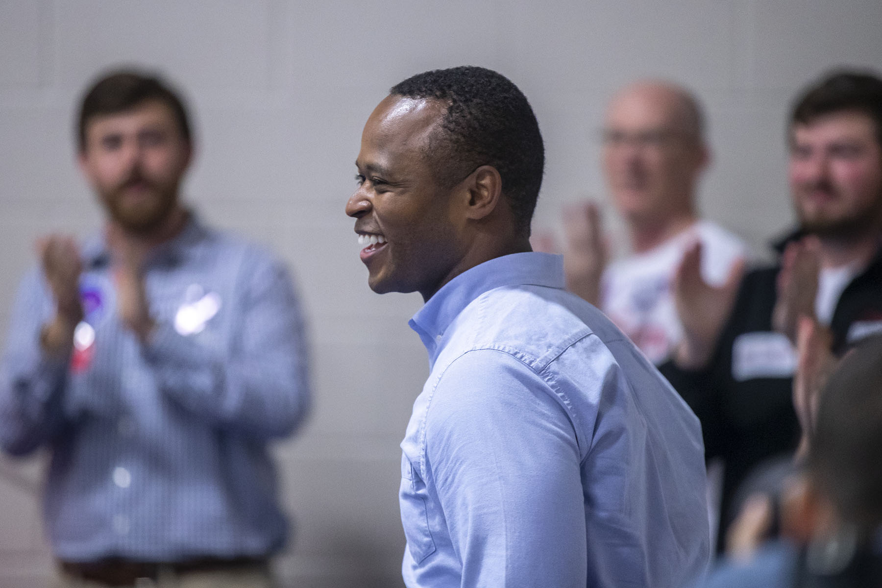 Daniel Cameron smiles as he is greeted with applause as he arrives at the Graves County Republican Party Breakfast.