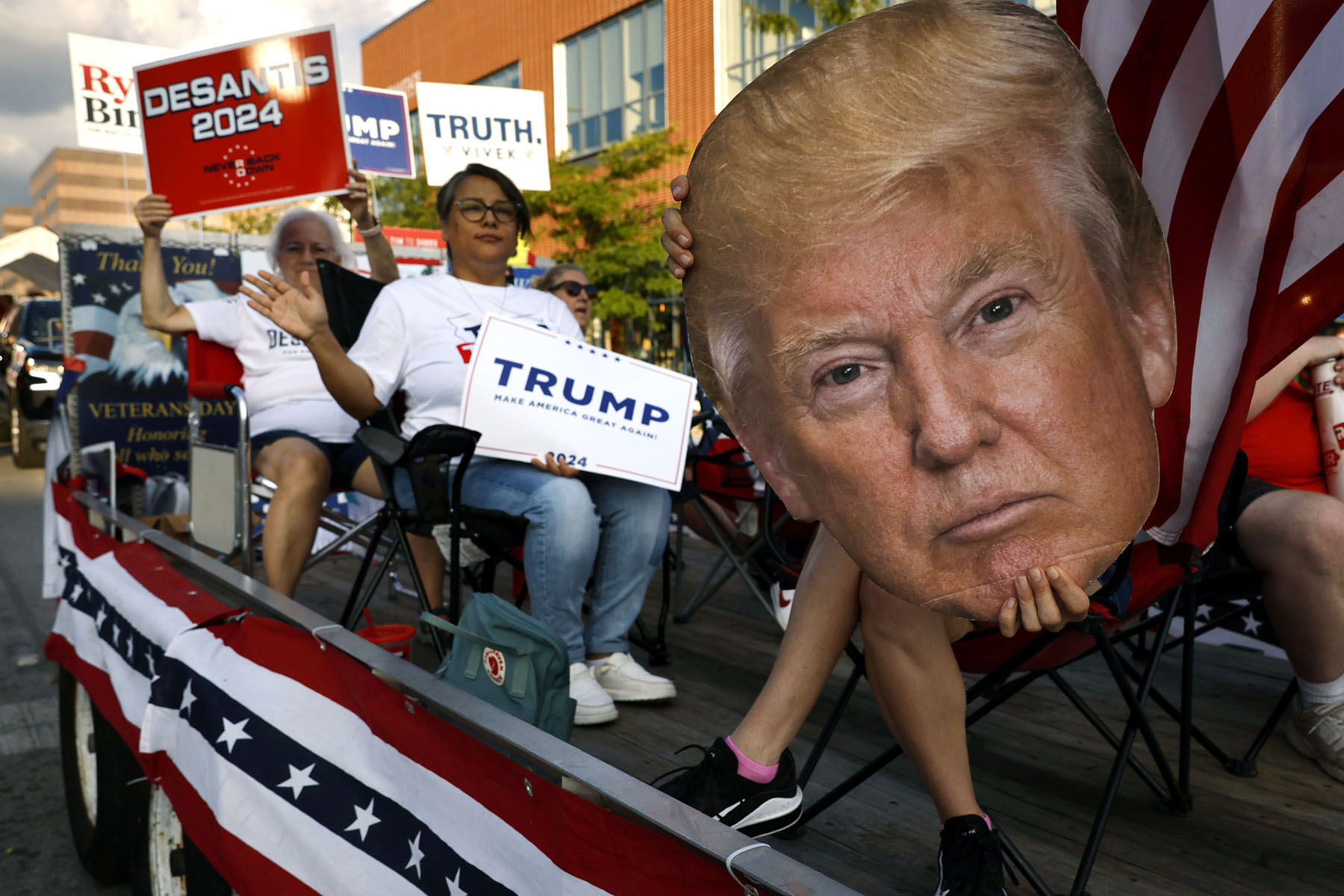 Members of the Republican Party of Iowa show their support for a variety of candidates during the Iowa State Fair Kick-Off Parade.