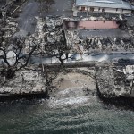 Homes and building are burned to the ground on the waterfront in Lahaina in the aftermath of wildfires.