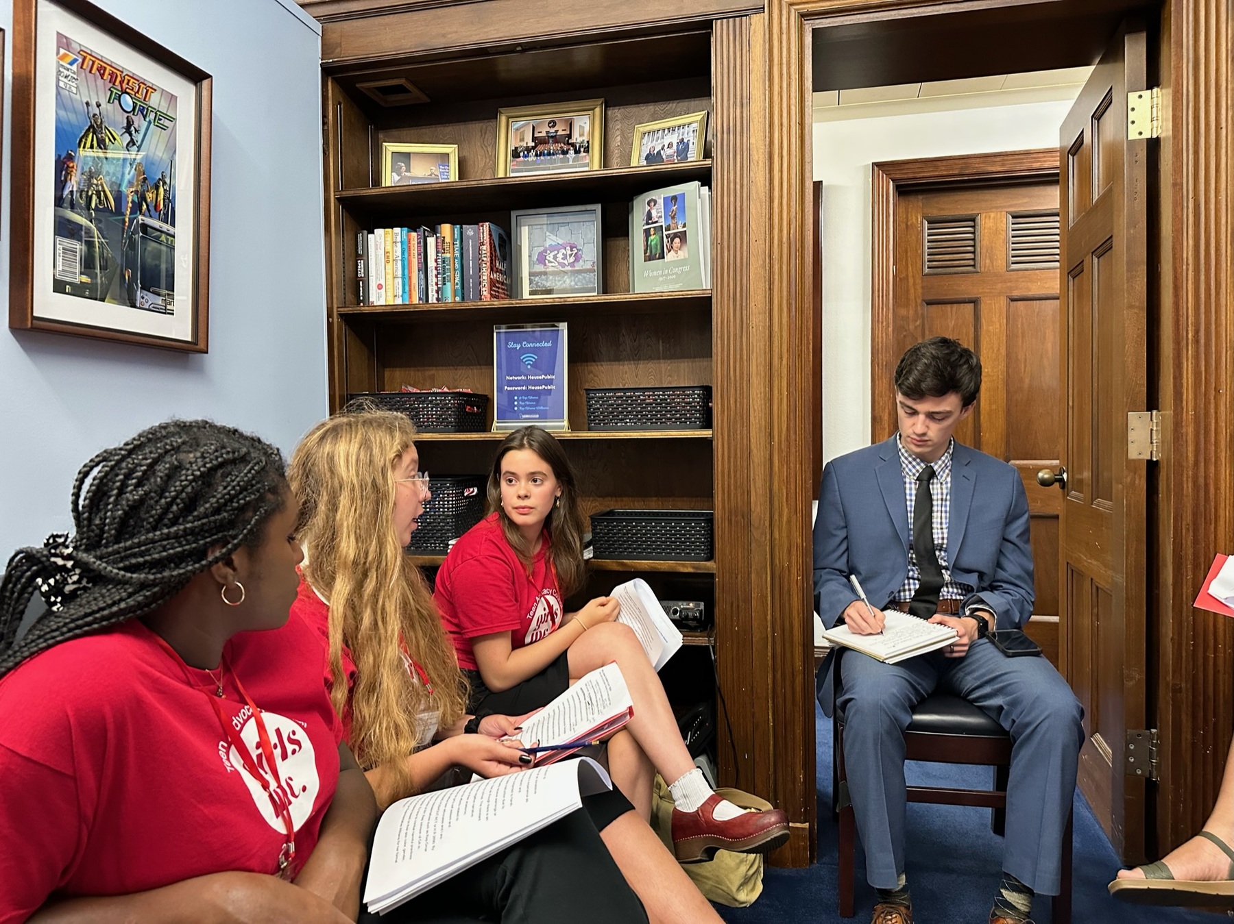 Members of the Teen Advocacy Council of Girls Inc. sit in a room in Washington, D.C.