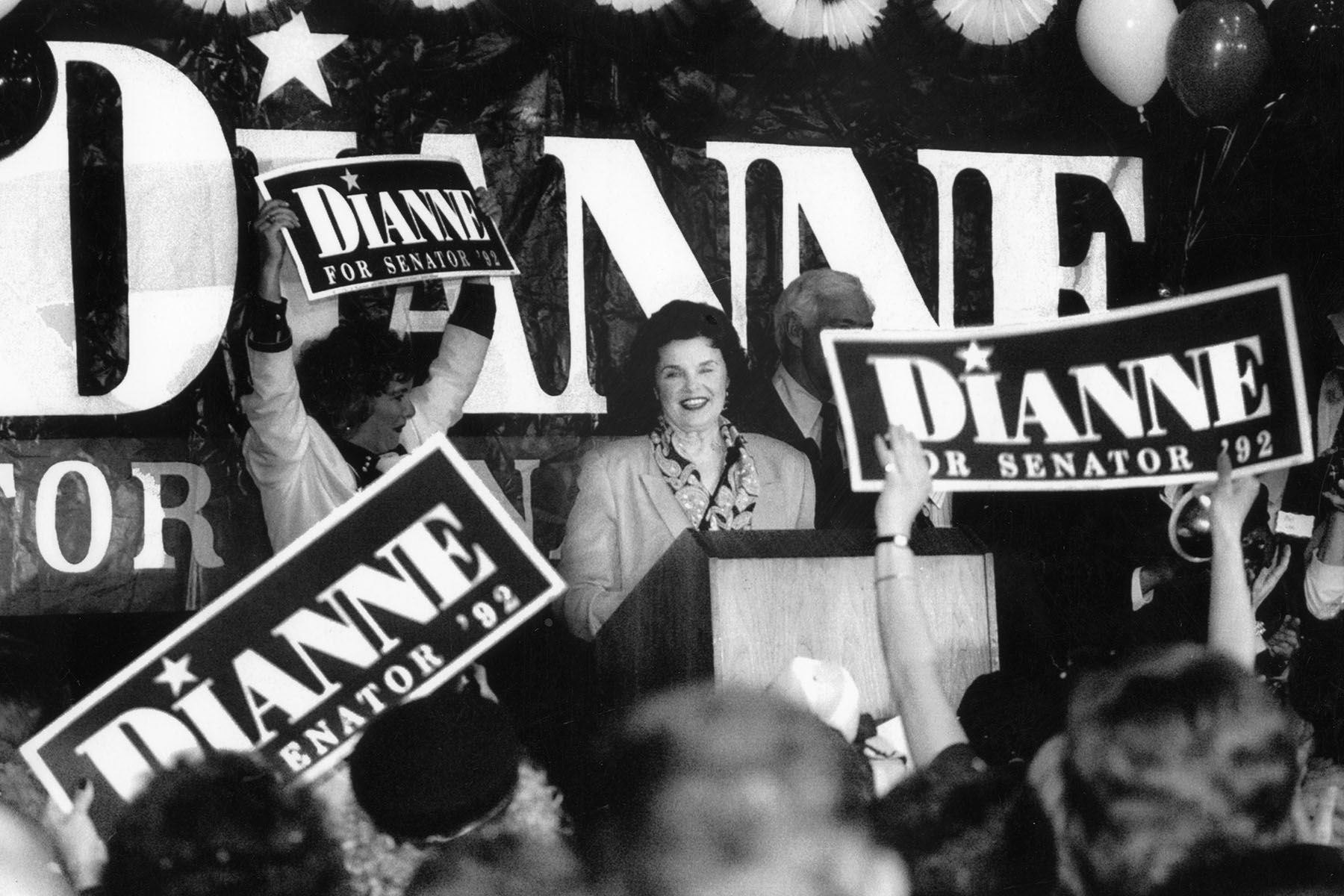 Dianne Feinstein, surrounded by supporters, celebrates her primary win in 1992.
