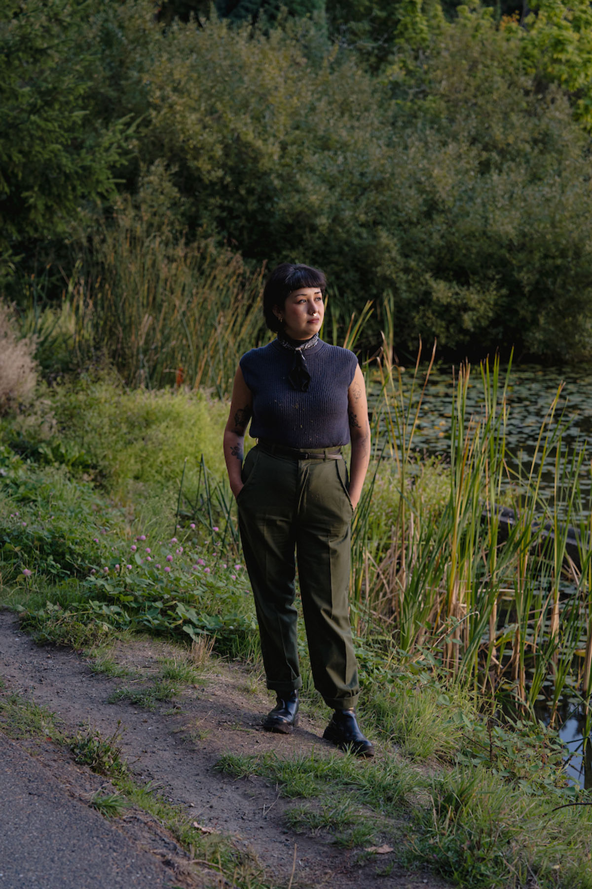Michelle Barboza “MB” Ramirez poses near the water at Seward Park in Seattle, Washington