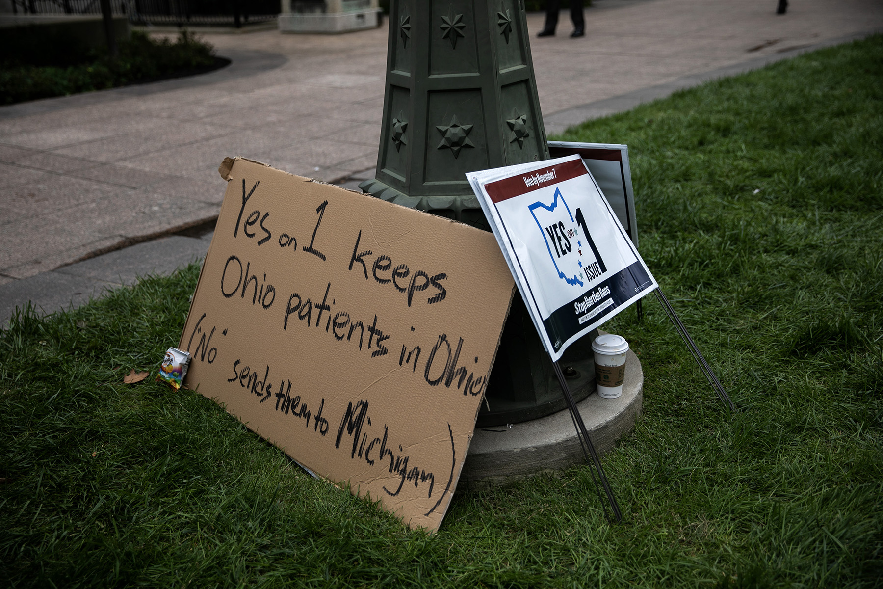 Signs for Issue 1 at a rally hosted by Ohioans United for Reproductive Rights outside of the Ohio Statehouse. They read "Yes on 1 Keeps Ohio Patients in Ohio ("No" sends them to Michigan)" and "Yes on Issue 1"