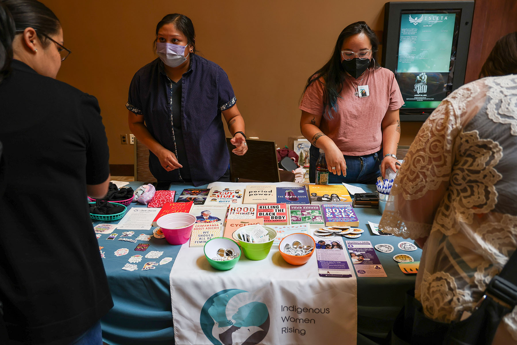 Sandy Harris (left) and Jonnette Paddy (right) with Indigenous Women Rising talk about abortion care and reproductive health with attendees at the “Women Are Sacred” conference.