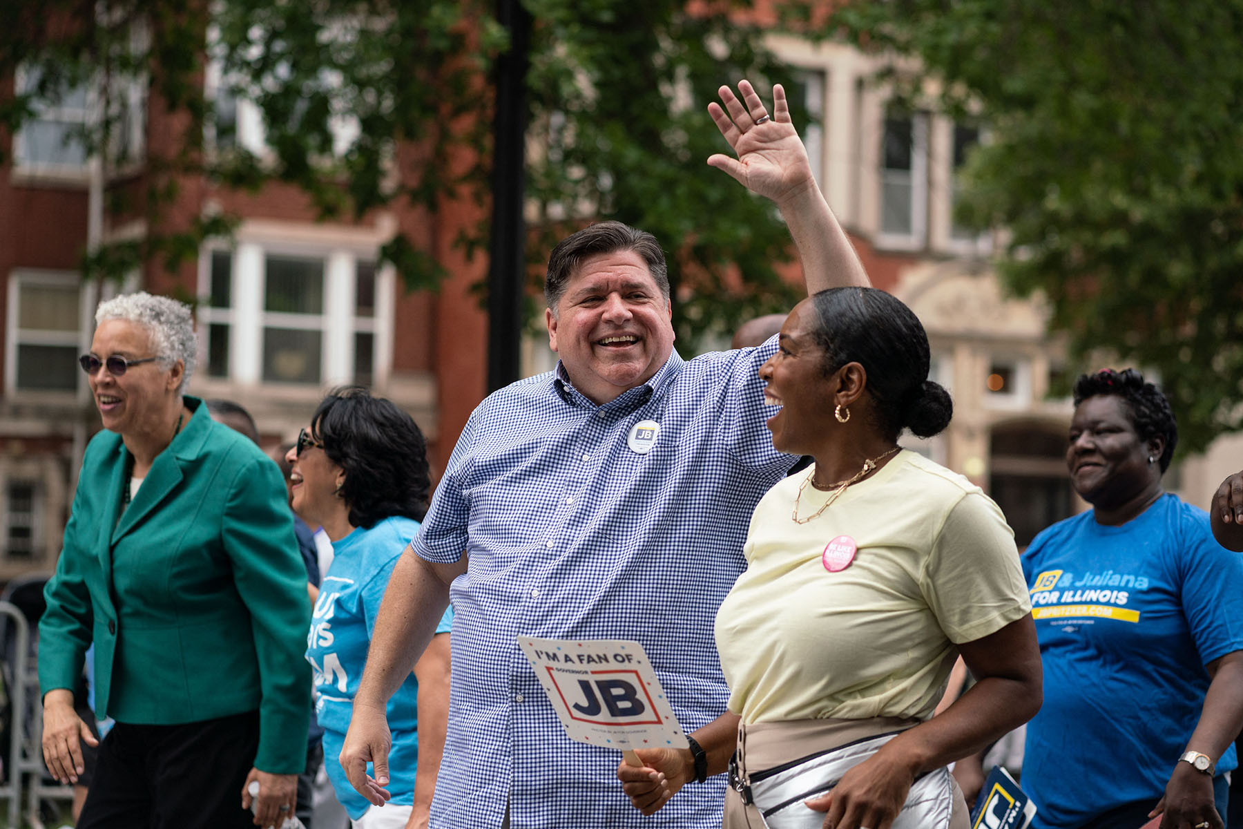 Illinois Governor J.B. Pritzker and Lieutenant Governor Juliana Stratton walk in the 93rd annual Bud Billiken Parade.