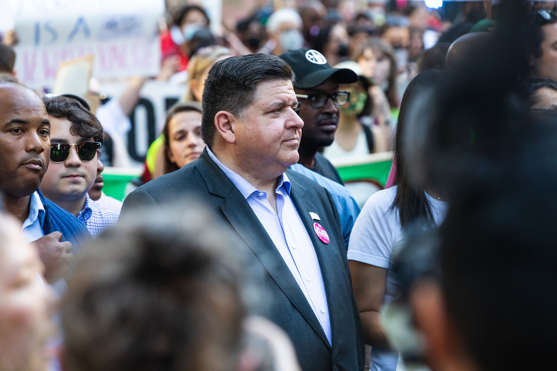 Gov. J.B. Pritzker marches with protesters during an abortion rights rally in Chicago.