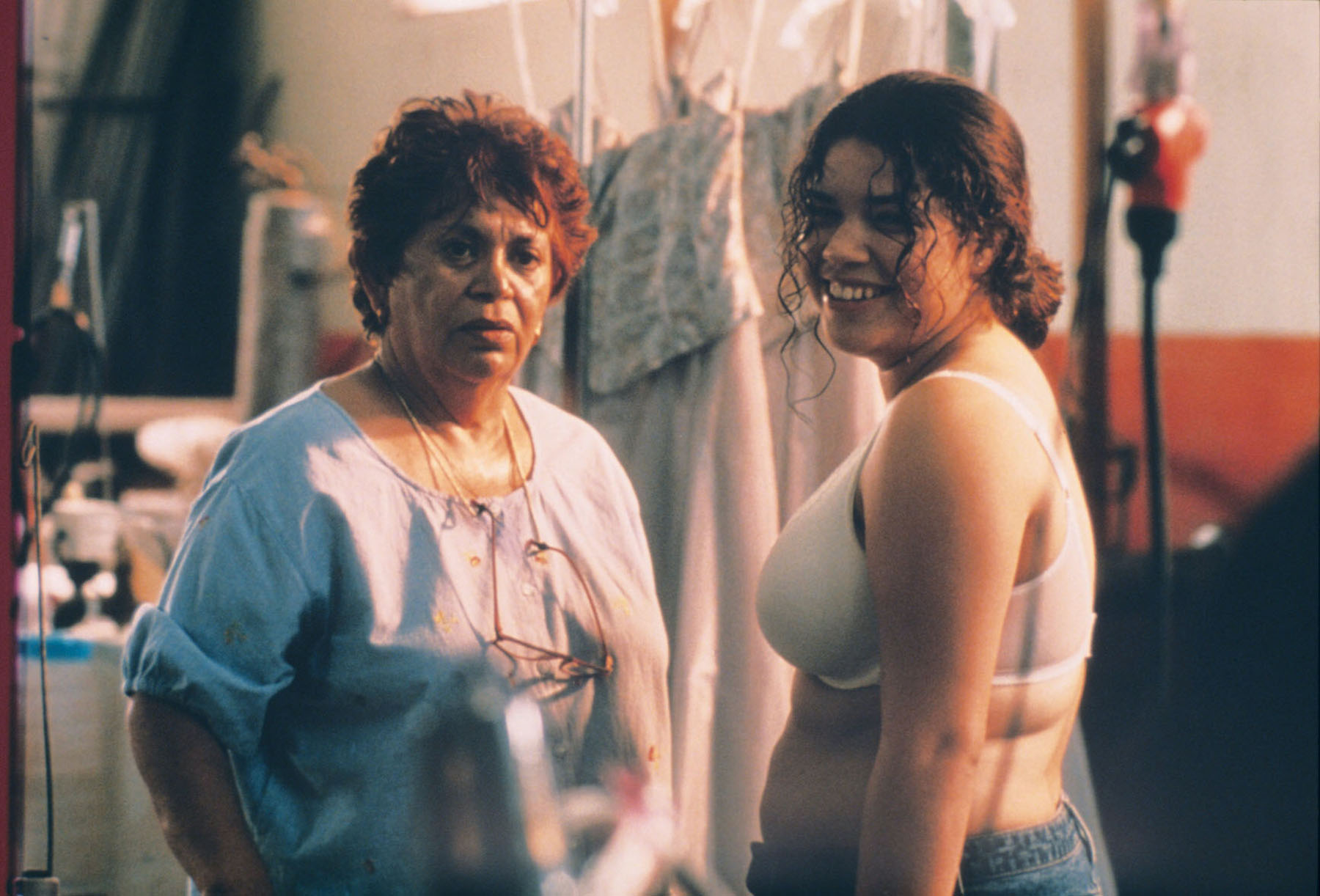 Lupe Ontiveros (as Carmen Garcia) and America Ferrera (as Ana Garcia) in Real Women Have Curves.