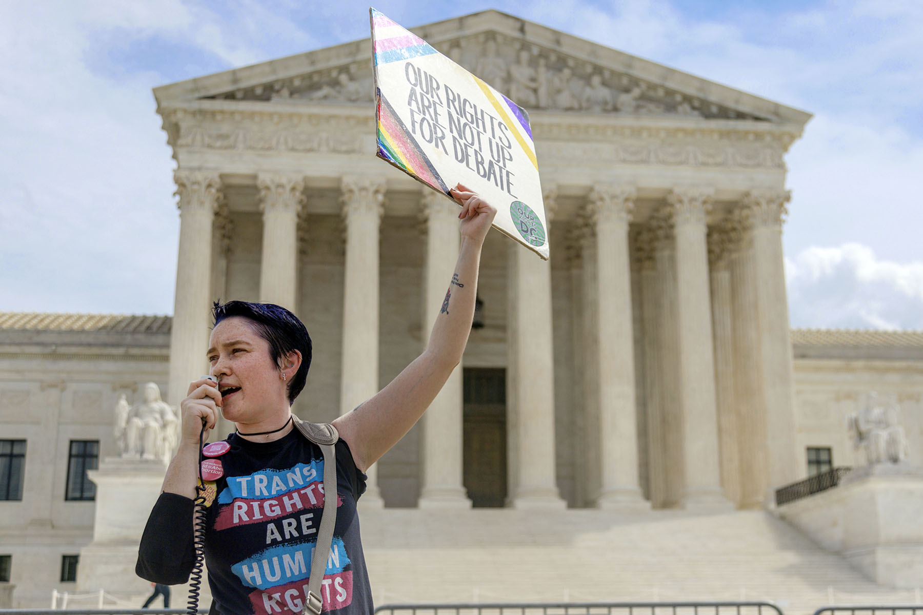 A demonstrator outside the Supreme Court in Washington, D.C. wears a 