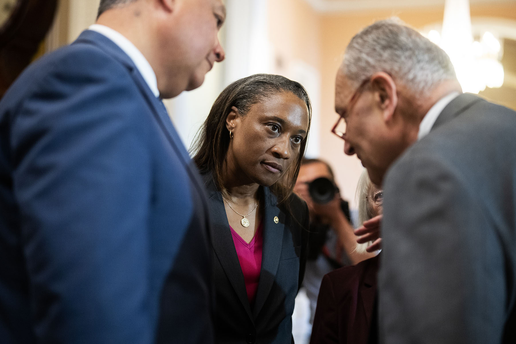 Sen. Laphonza Butler, Senate Majority Leader Charles Schumer (right) and Sen. Alex Padilla prepare for a news conference.