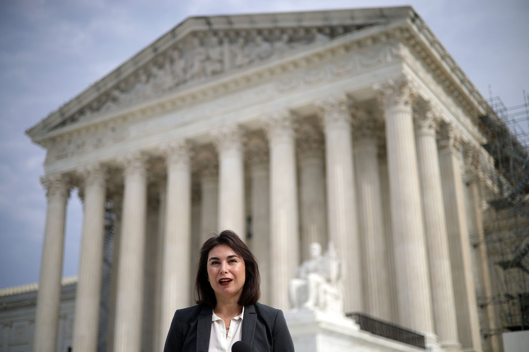 Esther Sanchez-Gomez speaks to members of the media outside the Supreme Court.