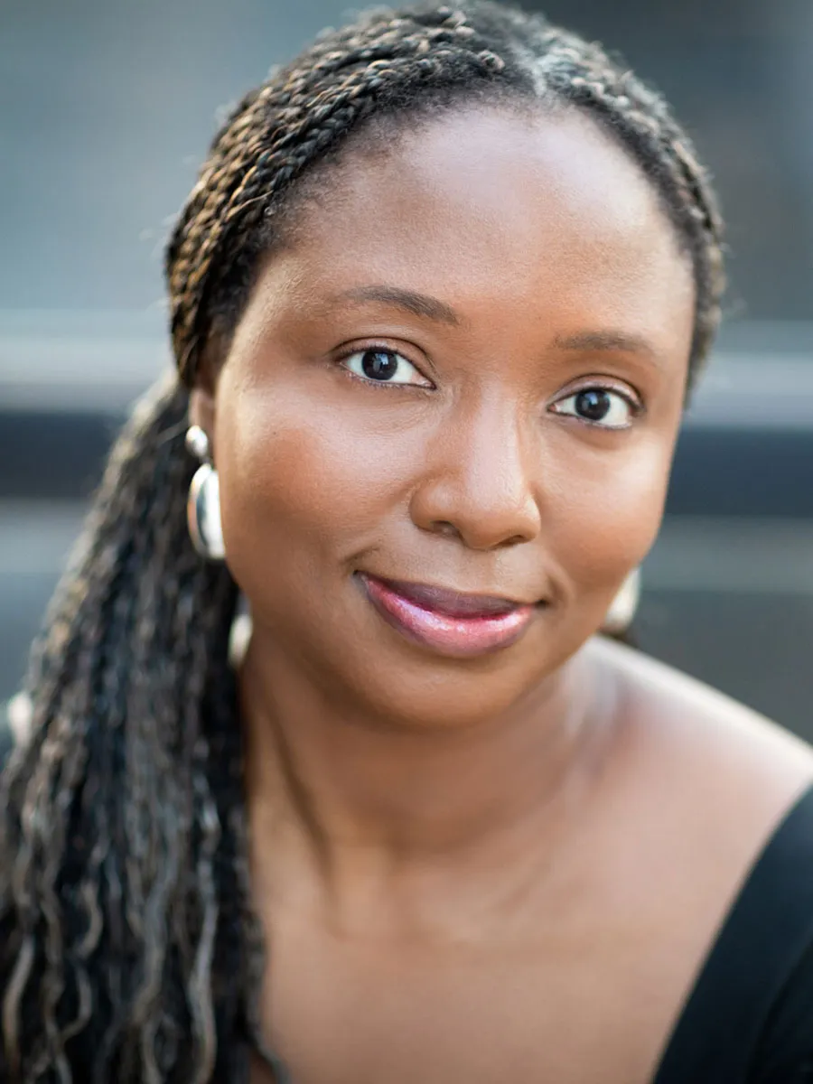 A portrait of author and The 19th's education reporter, Nadra Nittle.