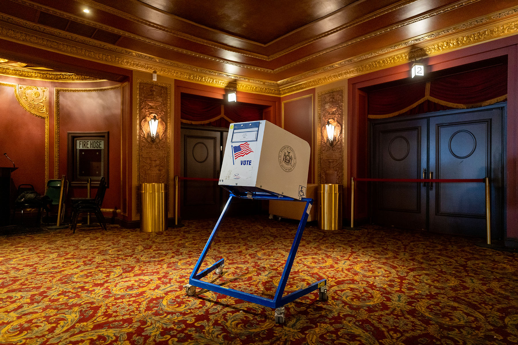 A voting booth sits empty at kings theater in the Brooklyn borough of New York City.