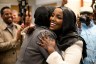 St. Louis Park Mayor-elect Nadia Mohamed is embraced by a supporter after winning her election.
