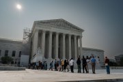 People line up outside of the Supreme Court in June 2023 in Washington, D.C.
