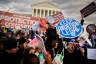 Abortion-rights supporters stage a counter protest in front of the Supreme Court during the 50th annual March for Life rally.
