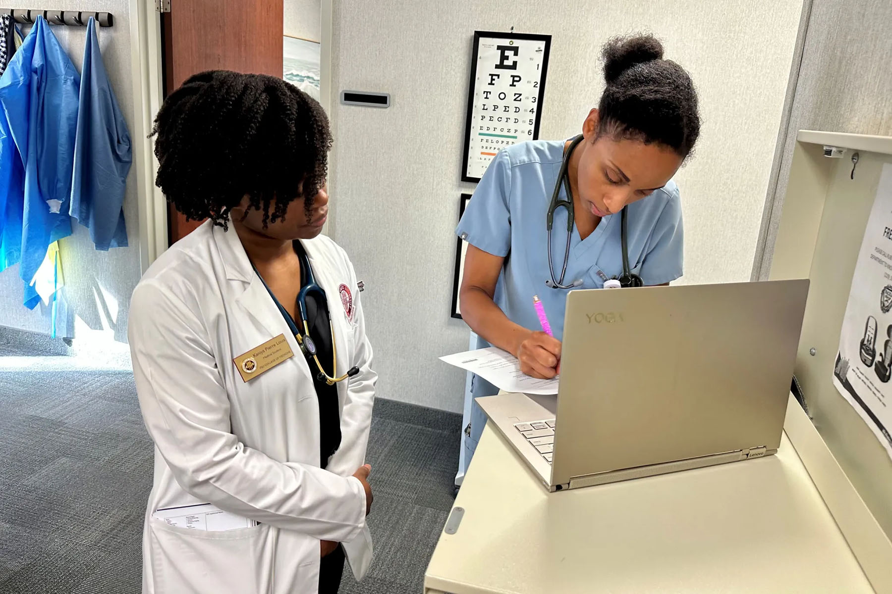 A medical student is seen shadowing family medicine physician Zita Magloire.