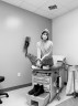 At their post-operative doctors appointment, Josie Norris poses in a patient room at UT Health OBGYN.