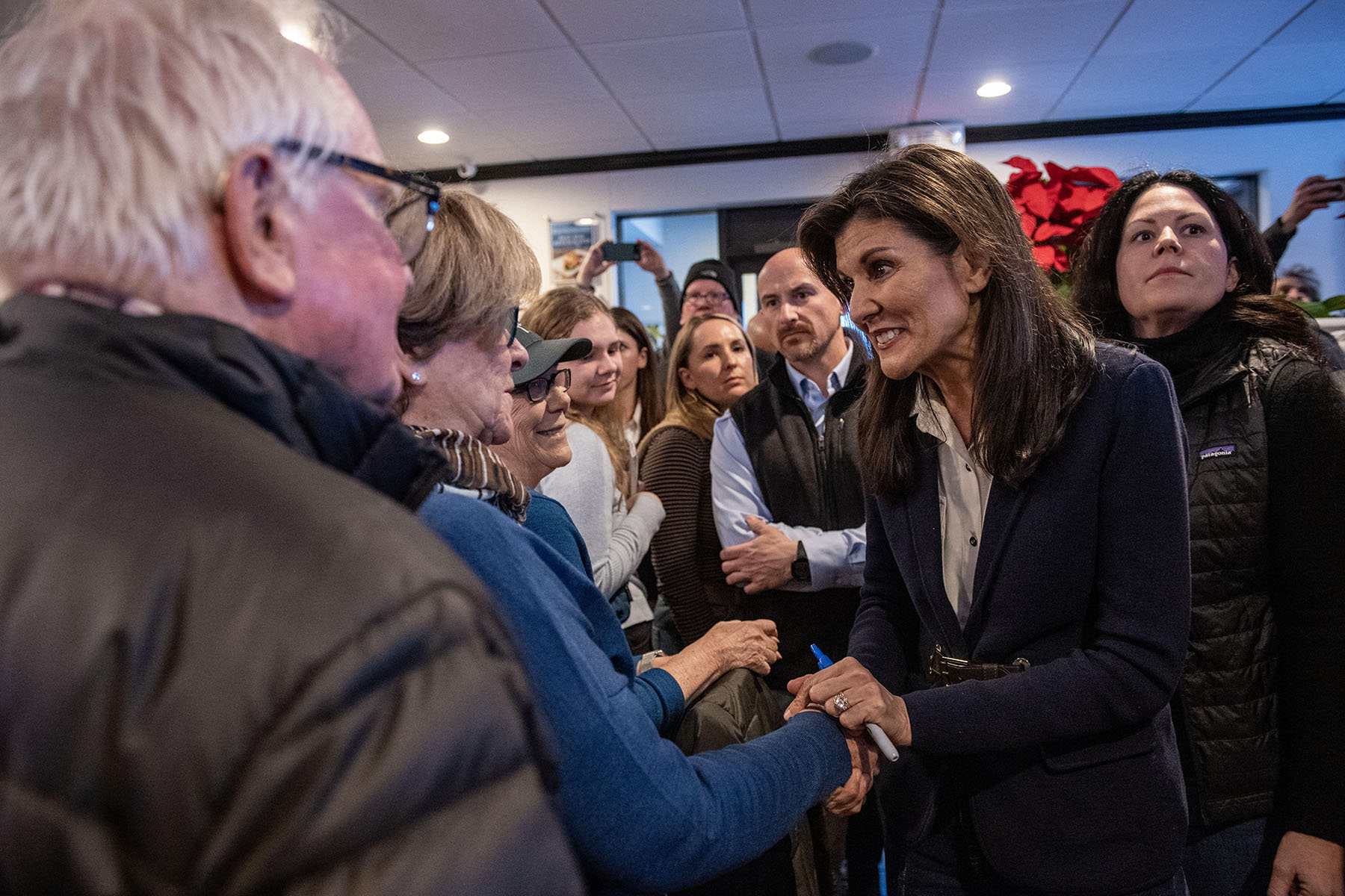 Nikki Haley greets voters at at the 603 Grill in Milford, New Hampshire.