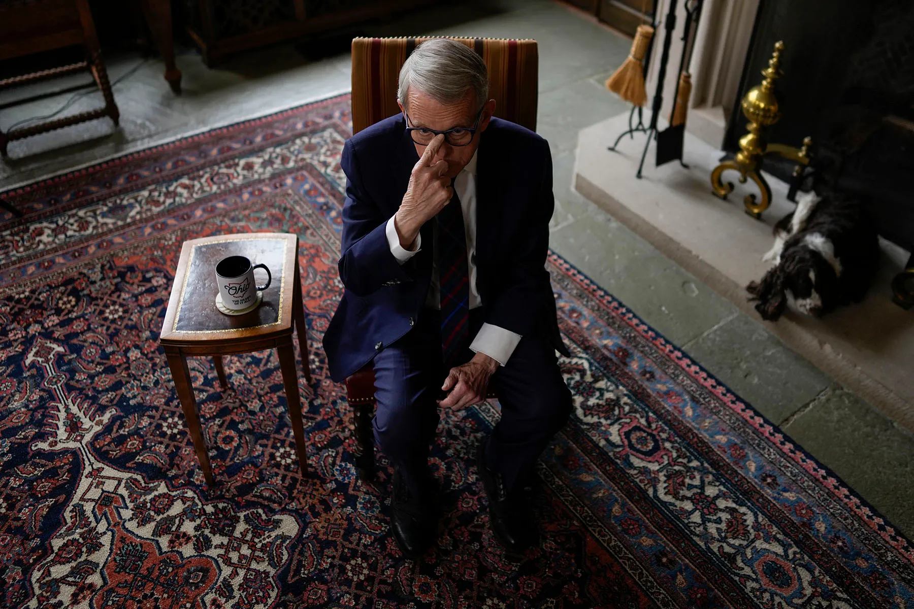 Ohio Gov. Mike DeWine pushes his glasses up on his nose as during an interview with at the Ohio Governor's Residence.