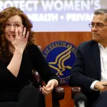 Stephanie Perry fights back tears as she shares her story to Secretary of U.S. Health and Human Services Xavier Becerra