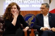 Stephanie Perry fights back tears as she shares her story to Secretary of U.S. Health and Human Services Xavier Becerra