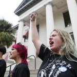 Abortion rights activists demonstrate near the Florida State Capitol.