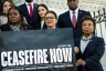 From left, Rep. Cori Bush, Rep. Alexandria Ocasio-Cortez, Rep. Rashida Tlaib, Rep. Barbara Lee and other Democrats pose for a photo with a sign calling for a ceasefire in Gaza outside the Capitol.