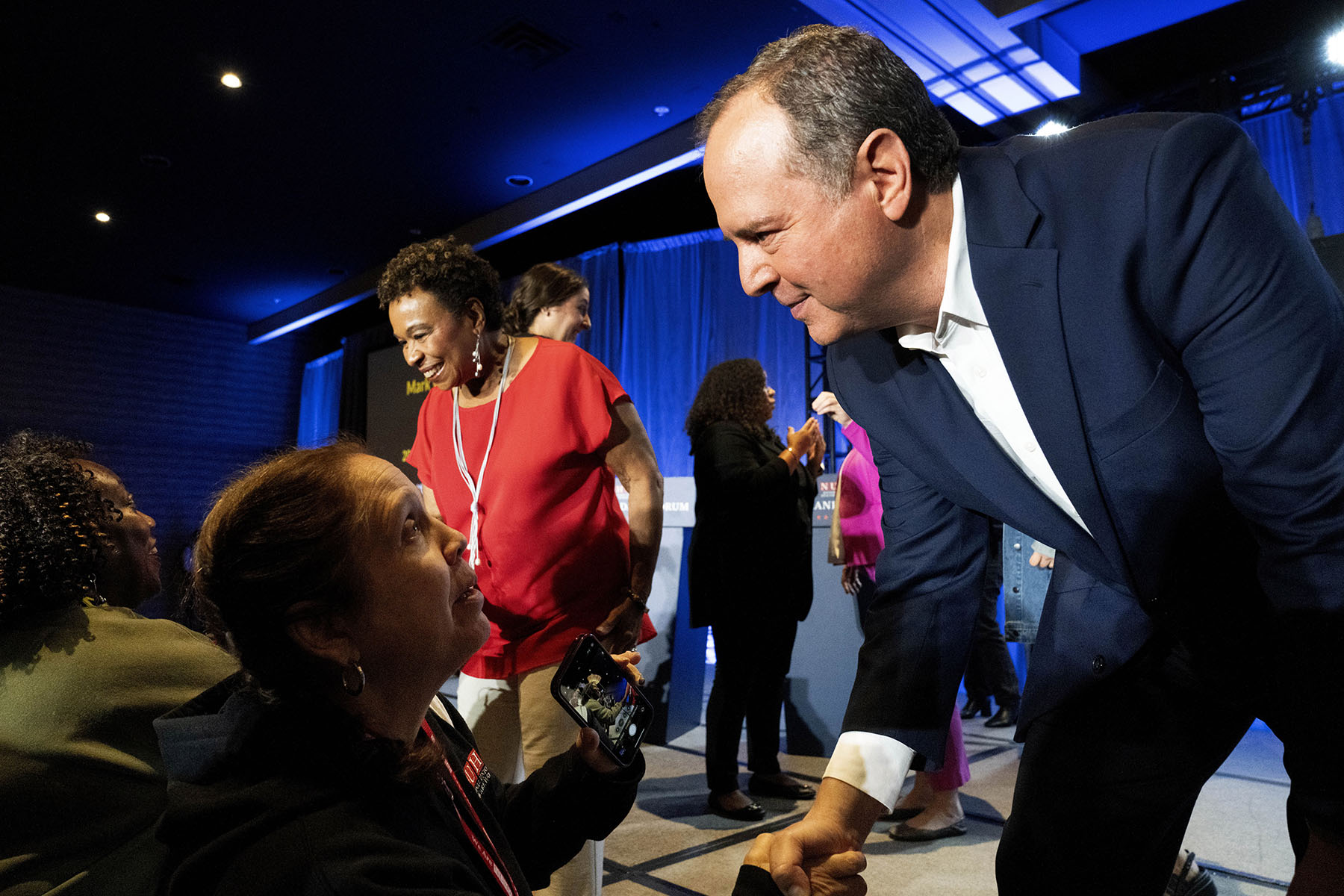 Rep. Adam Schiff and Rep. Barbara Lee greet supporters after a U.S. Senate Candidate Forum