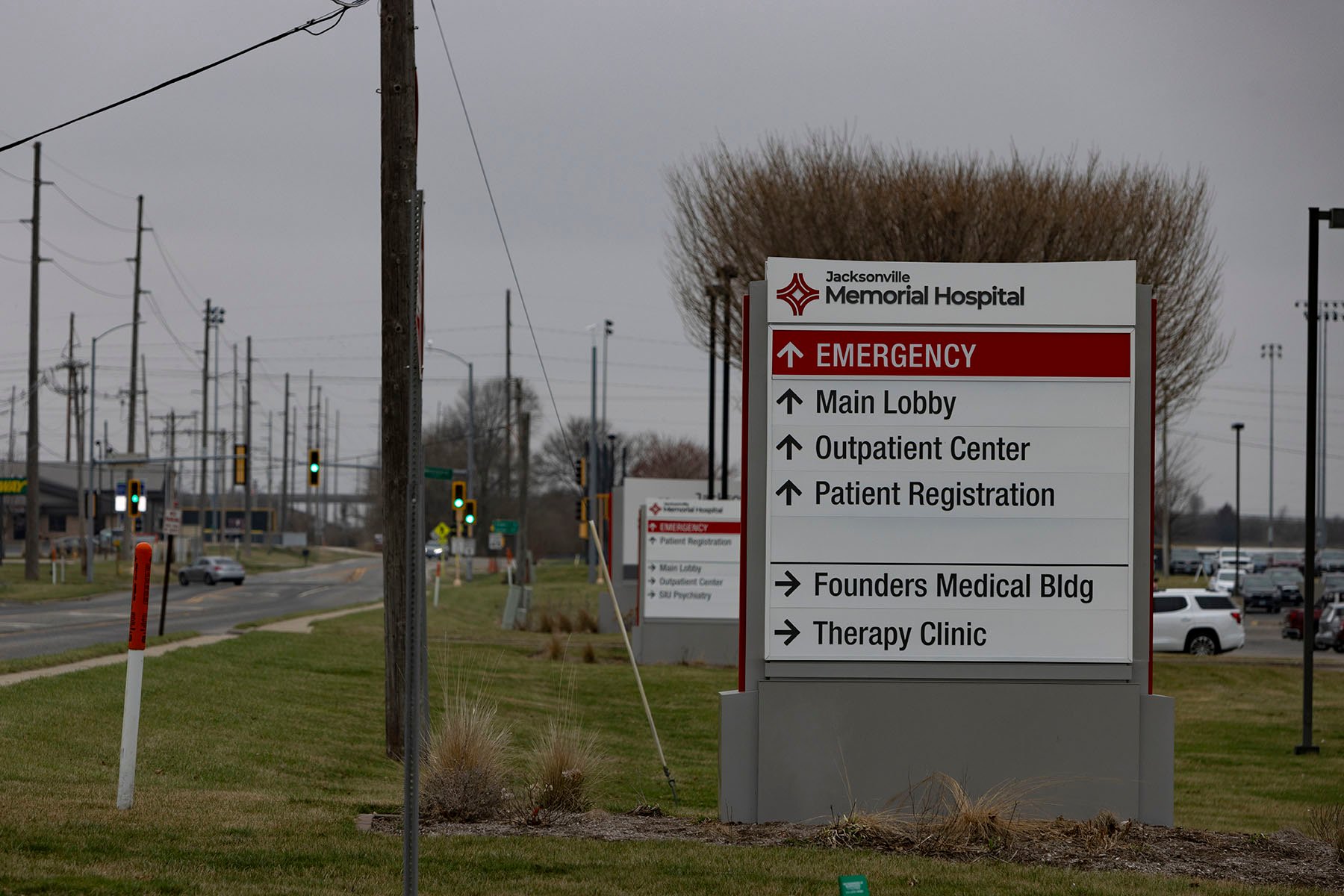 Signs for Jackson Memorial Hospital are seen in Jacksonville, Illinois.