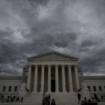 supreme court building on a cloudy day