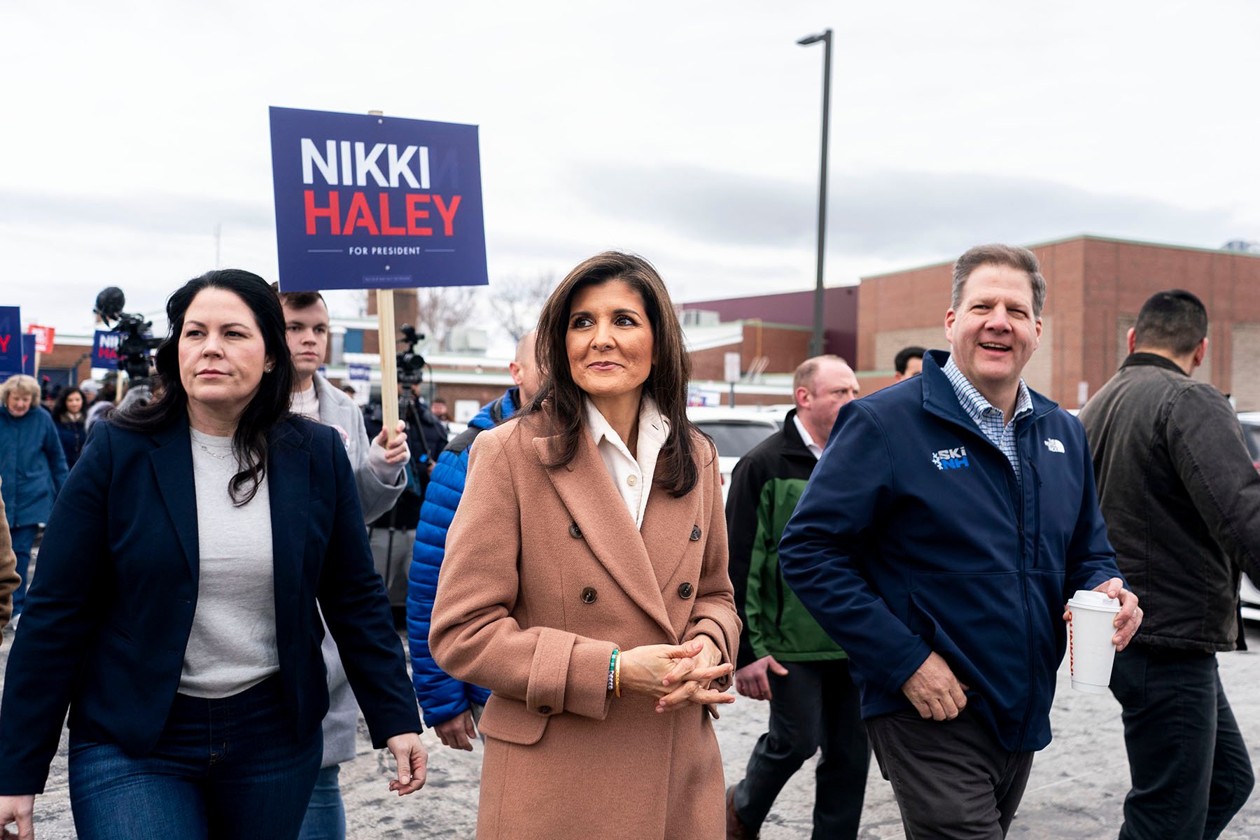 Nikki Haley and New Hampshire Governor Chris Sununu greet voters as they make their way to the polls.