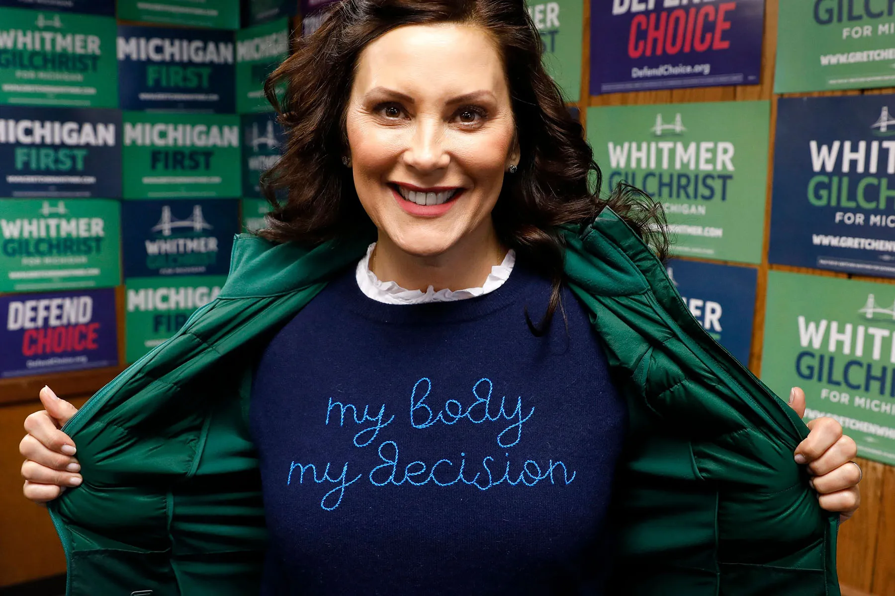 Michigan Gov. Gretchen Whitmer shows off her "My Body My Decision" shirt as she poses for a portrait.