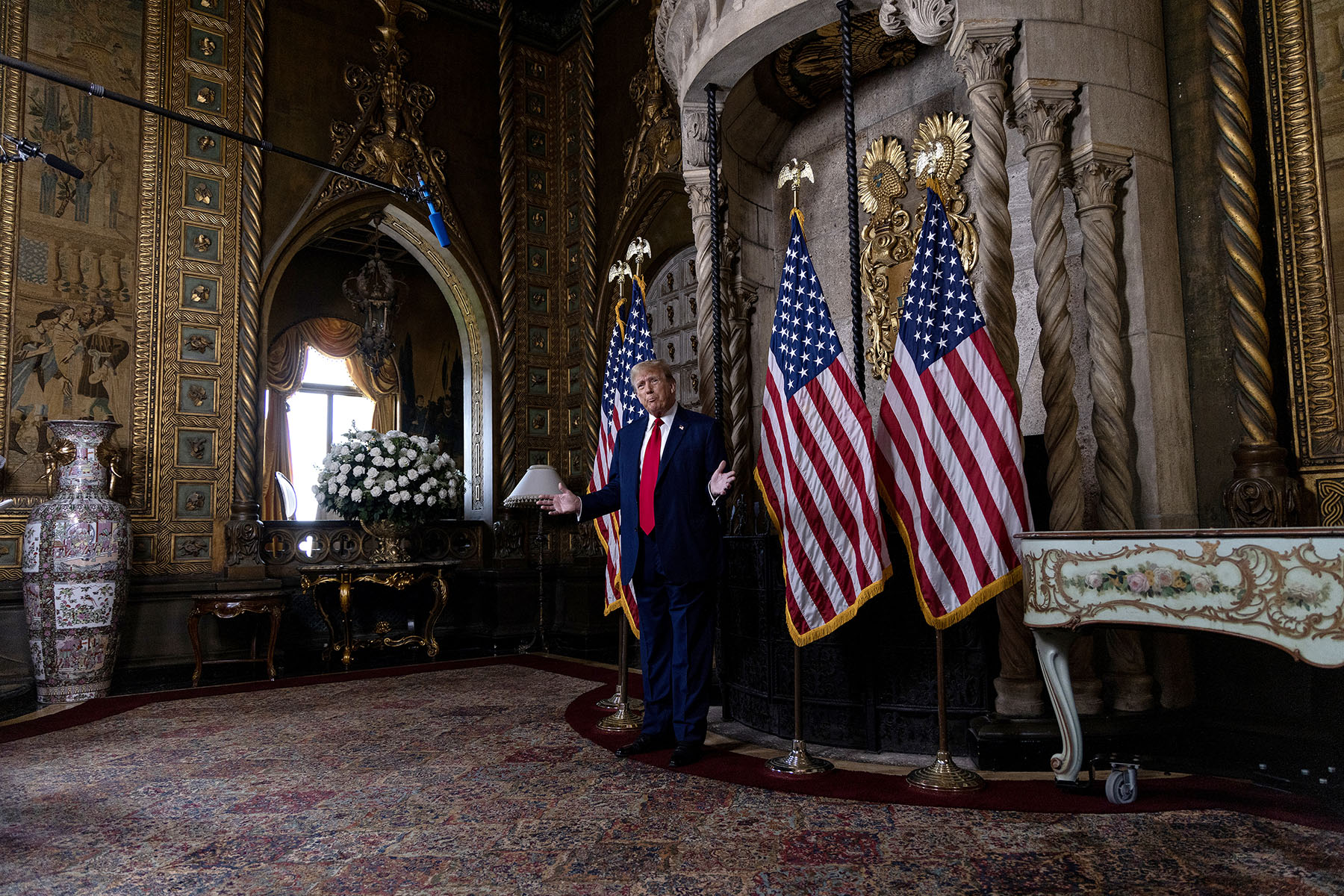 Former President Donald Trump speaks in the library at Mar-a-Lago.