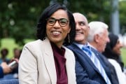 Angela Alsobrooks smiles as she sits during a press conference in Capitol Heights, Maryland.