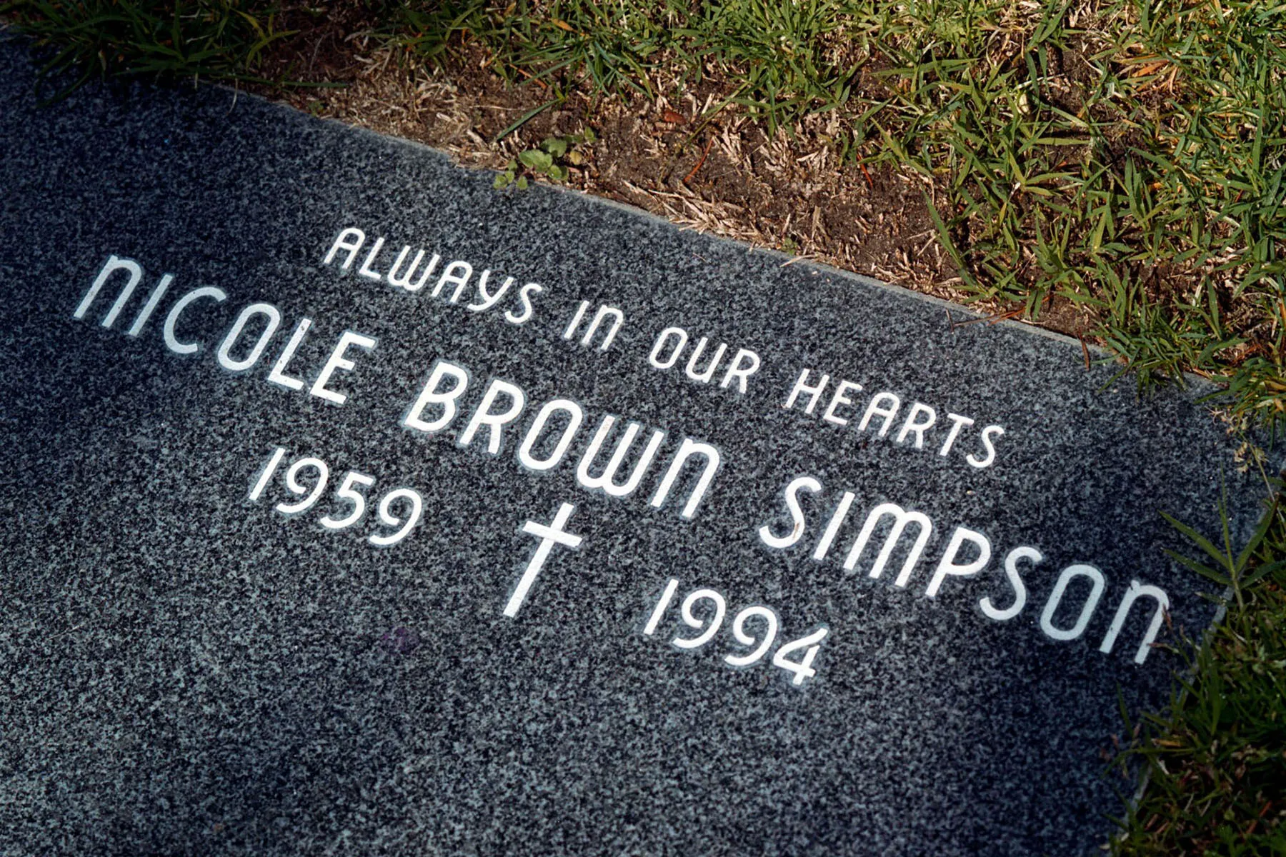 The grave of Nicole Brown Simpson reads "always in our hearts, Nicole Brown Simpson, 1959-1994