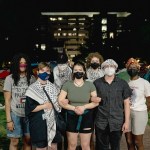 Gallaudet University students stand for a portrait at the George Washington University encampment.