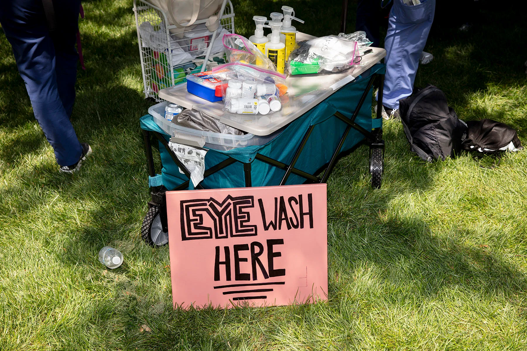 Emory medical school students set up an eye wash and first aid station on the quad at Emory.
