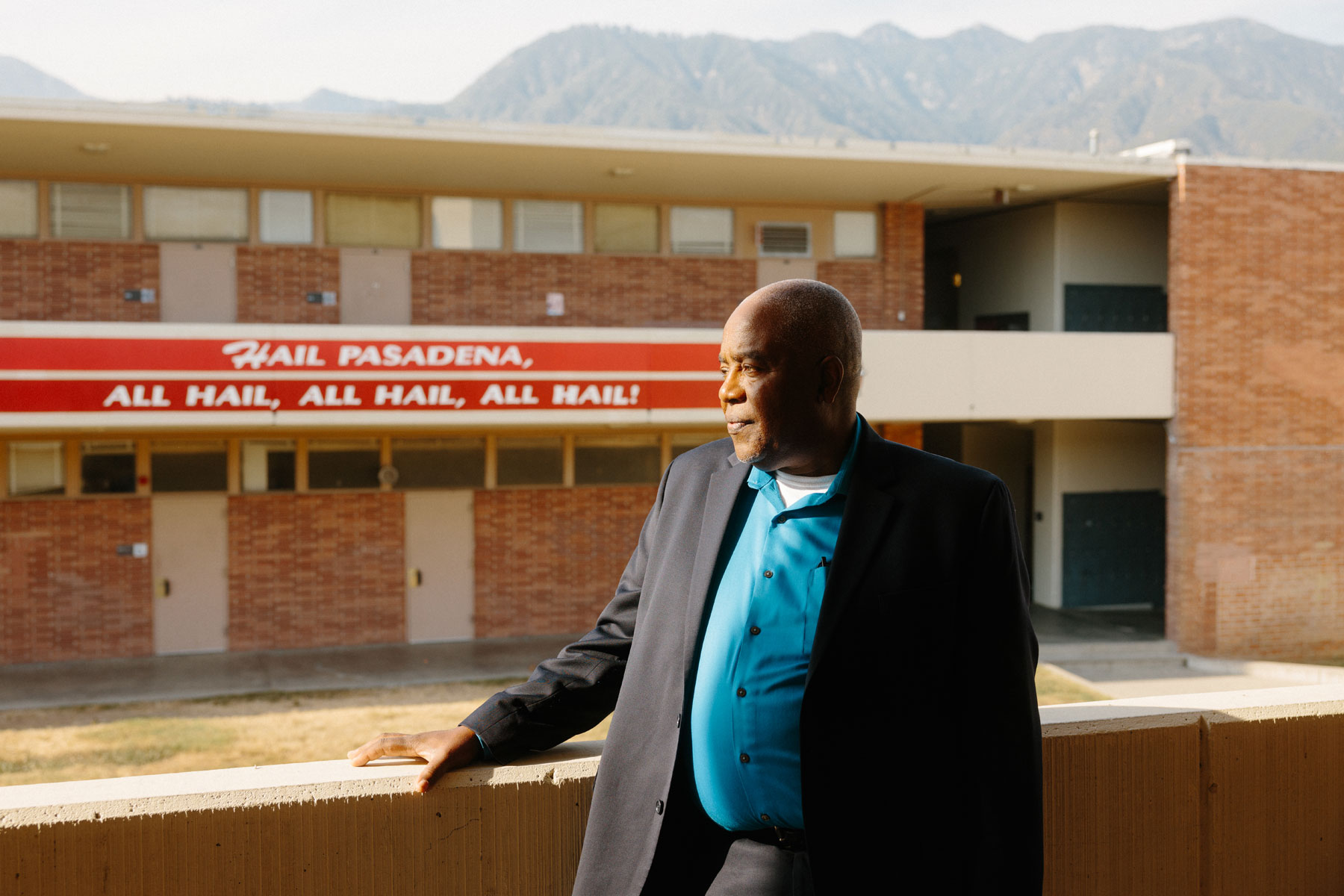 An image of Dr. Brian McDonald posing outside at Pasadena High School.