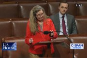 A screenshot from CSPAN of US Representative Jennifer Wexton, VA (10th District) speaking at a podium.