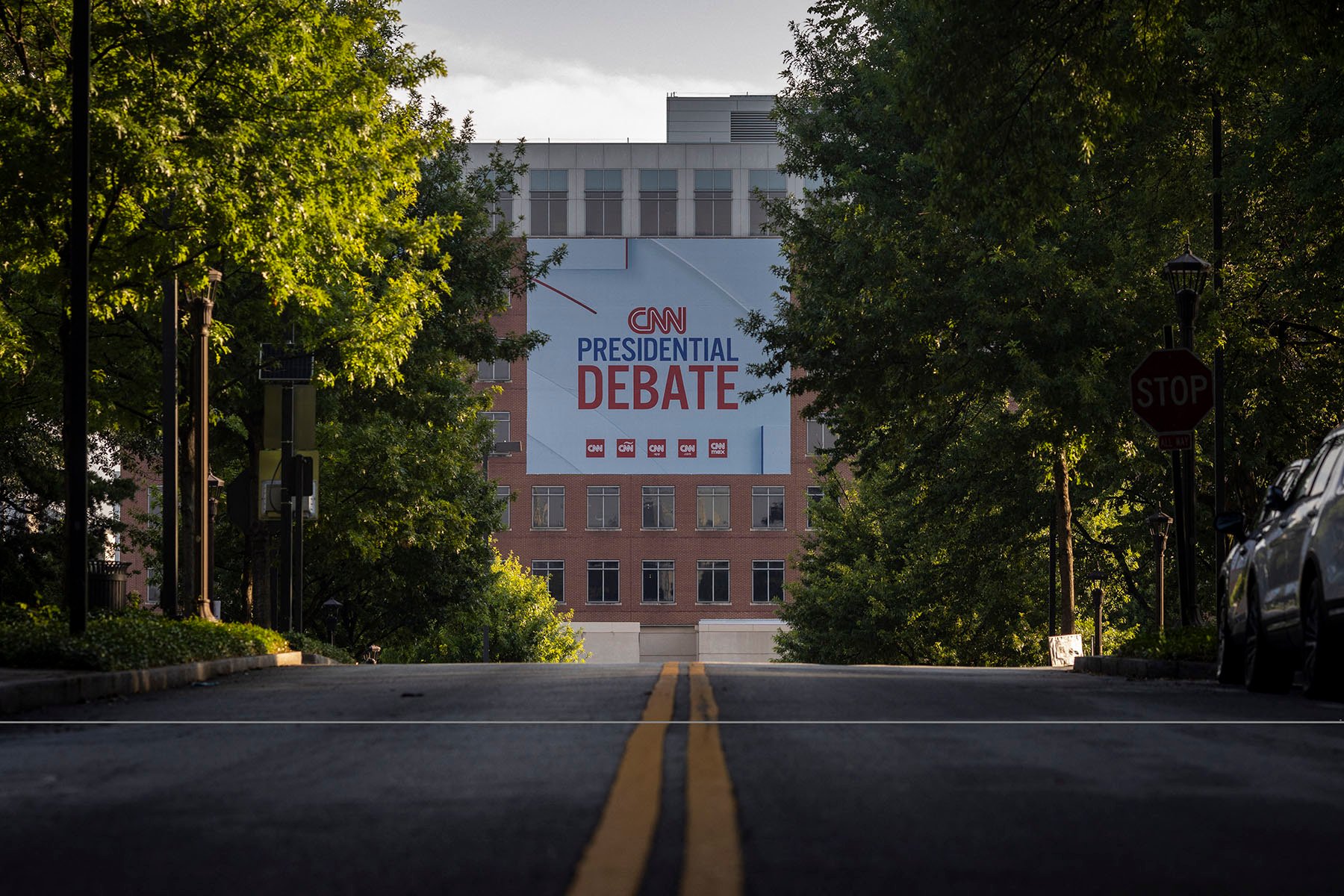 Banners are placed outside of CNN studios ahead of the first presidential debate in Atlanta, Georgia on June 24, 2024. The Banner reads "CNN Presidential Debate."