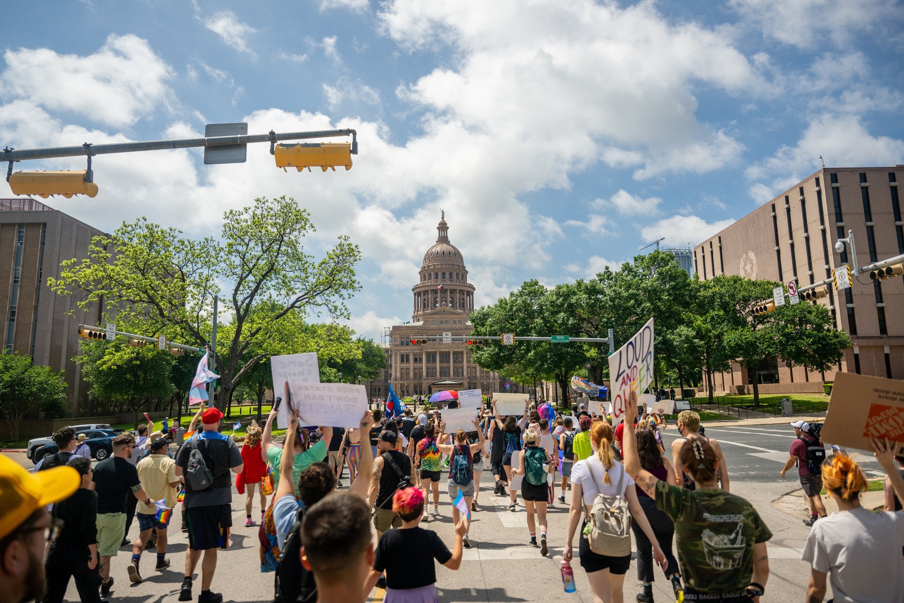 People march to the Texas State Capitol during a Queer March demonstration.