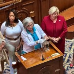 Sen. Katrina Shealy holds up the John F. Kennedy Profile in Courage Award given last fall to the five bipartisan “sister senators” who helped block a near-total abortion ban