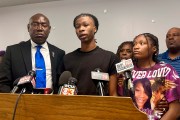 Malachi Hill Massey, flanked by civil right attorney Ben Crump and Sonya Massey's daughter, Jeanette Summer Massey, speaks at a news conference at the NAACP headquarters.