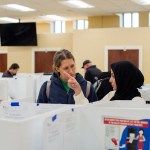 A poll worker helps a voter in Columbus, Ohio.