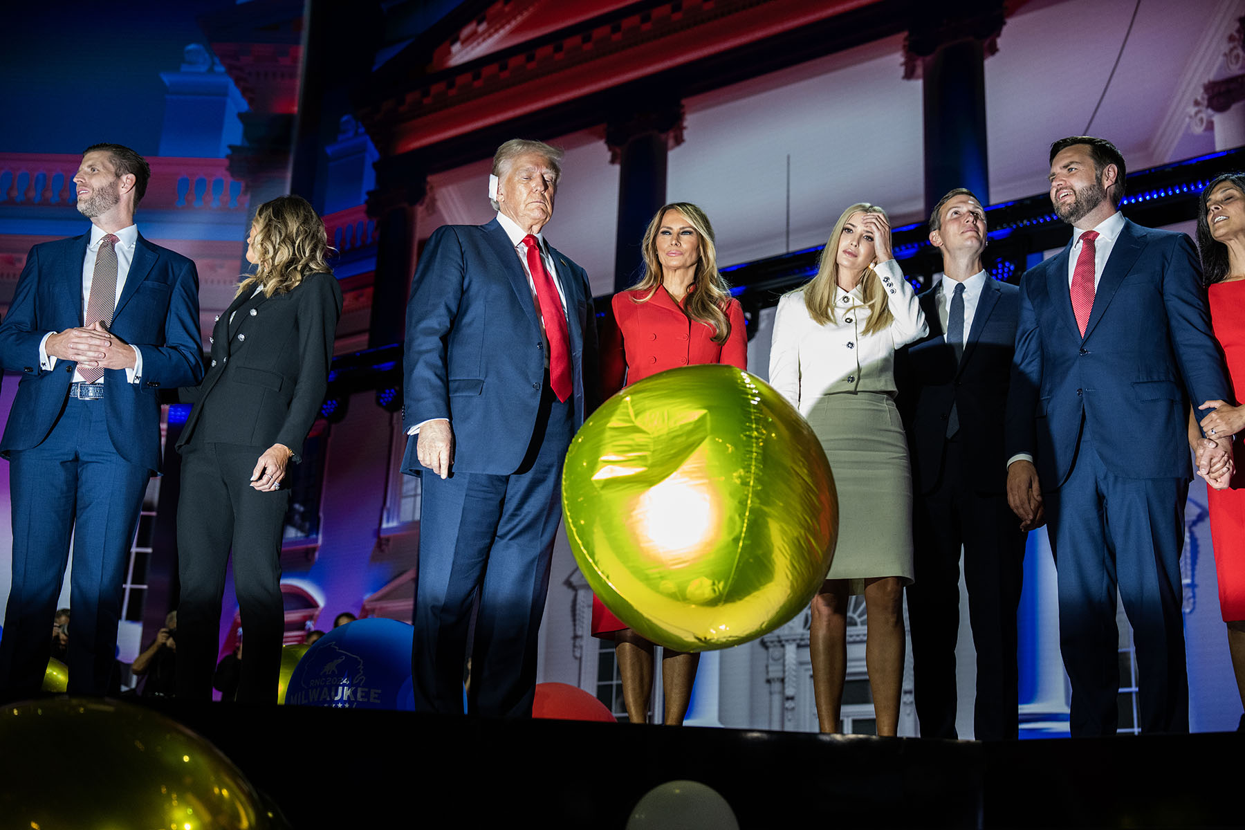 From left, Eric Trump, Lara, Trump, former President Donald Trump, former first lady Melania Trump, Ivanka Trump, Jared Kushner, VP nominee Sen. JD Vance and his wife Usha Chilukuri Vance, celebrate during the balloon drop at the RNC.